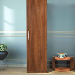 Space-saving wardrobe acting as a room divider in a studio apartment