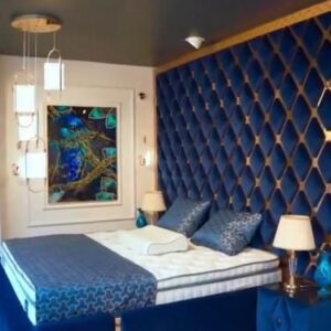 Modern velvet storage bed with chevron panel headboard, handcrafted in Dubai Modern velvet storage bed with chevron panel headboard, handcrafted in Dubai