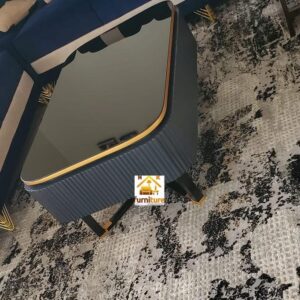 Modern wooden center table with glass surface in UAE living room