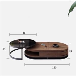 Dual-top Stravo table showing sliding round black glass surface Dual-top Stravo table showing sliding round black glass surface
