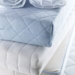High-density foam and spring mattress for back support