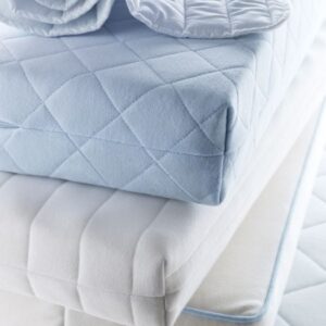 High-density foam and spring mattress for back support
