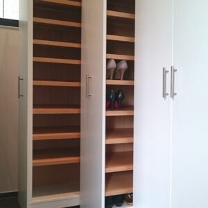 SlimMax pull-out wardrobe unit in ultra-slim vertical design for compact spaces"