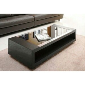 Modern wooden coffee table styled in UAE living room Modern wooden coffee table styled in UAE living room