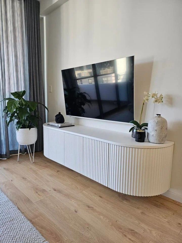 Modern Curved Fluted Wall-Mounted TV Console UAE Modern Curved Fluted Wall-Mounted TV Console UAE